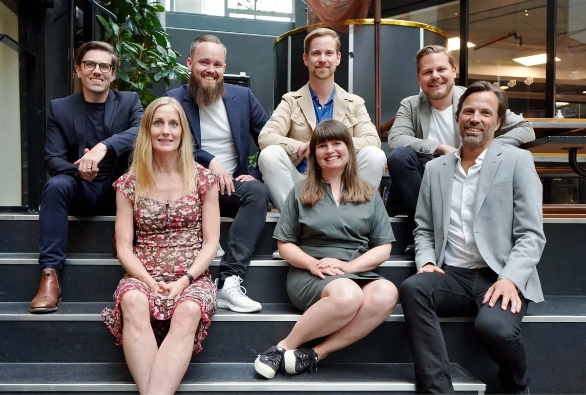The Adway team photographed together at their office