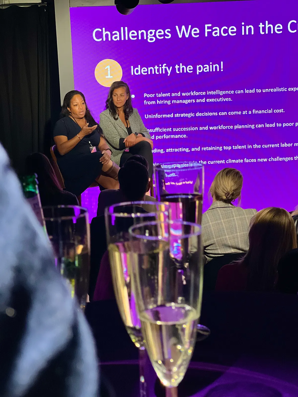 Speakers discussing talent acquisition challenges at the recruiting insights event